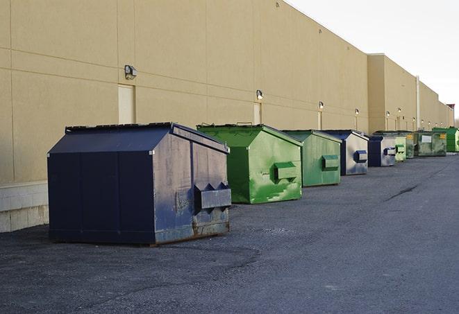 a pack of different construction bins lined up for service in Bernville, PA